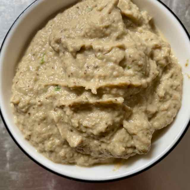 A bowl of aubergine puree flavoured with green chilli, tahini and garlic