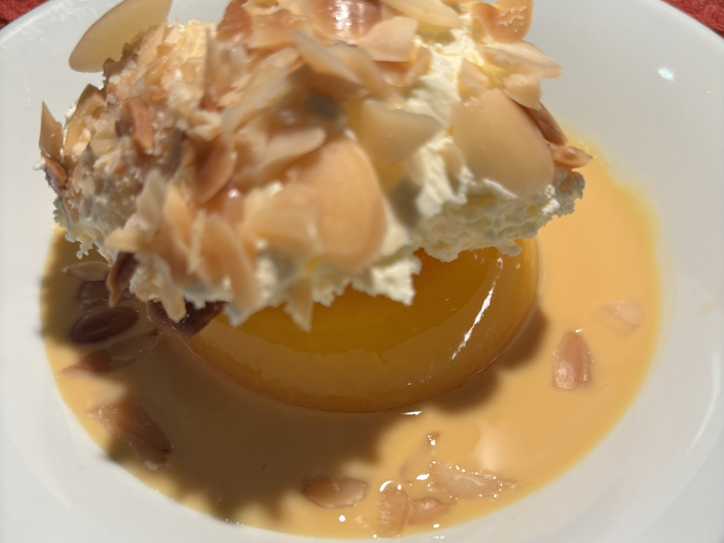 blood-orange jelly in a pond of Cointreau custard topped with whipped cream and flaked almonds